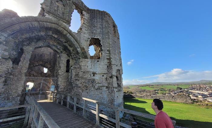 Person approaching a castle entrance